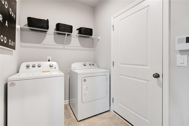 kitchen featuring white cabinets, a kitchen island, a kitchen bar, and stainless steel appliances