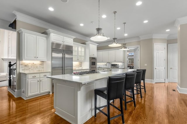 kitchen with white cabinets and a spacious island