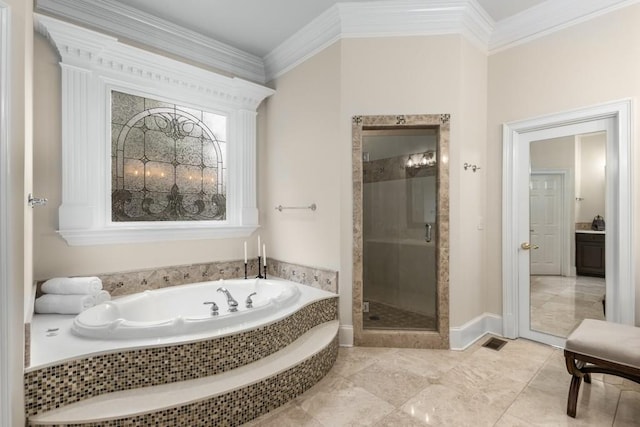 bathroom with crown molding and separate shower and tub