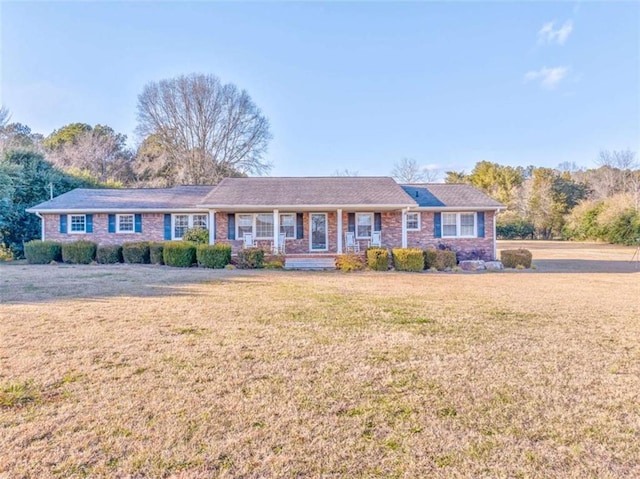 ranch-style house with a front yard