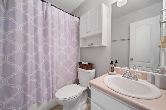 full bathroom featuring toilet, vanity, and shower / bath combo