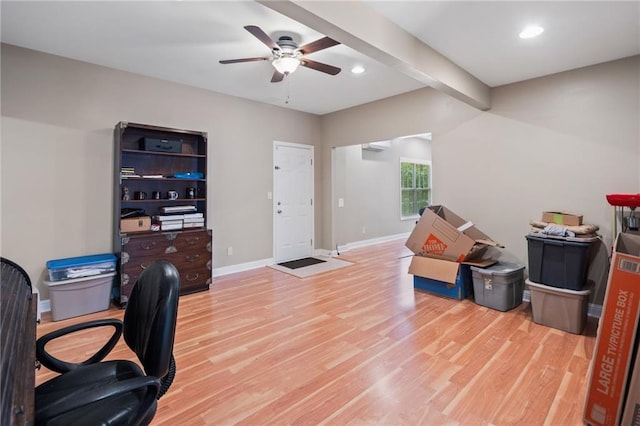 home office featuring a ceiling fan, recessed lighting, light wood finished floors, baseboards, and beam ceiling