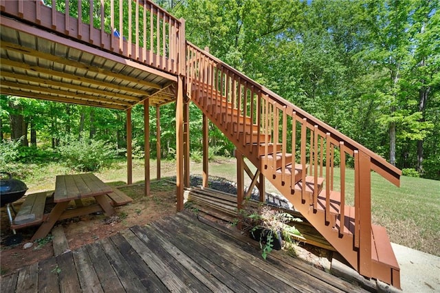 wooden terrace featuring stairs