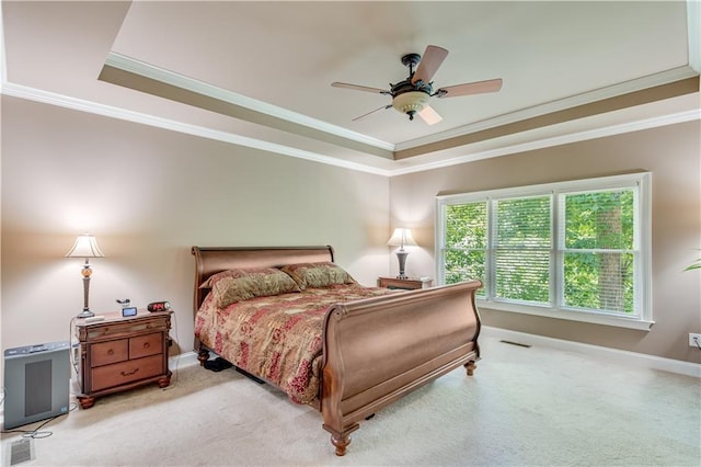 8240 Hurakan Creek Xing, Cumming, GA 30028 - bedroom with a raised ceiling, carpet, crown molding, baseboards, and a ceiling fan