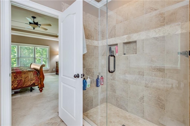 8240 Hurakan Creek Xing, Cumming, GA 30028 - ensuite bathroom featuring ornamental molding, a ceiling fan, and a stall shower