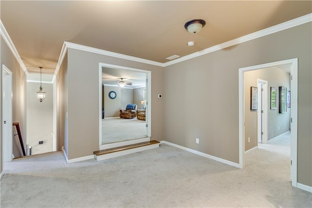 8240 Hurakan Creek Xing, Cumming, GA 30028 - carpeted spare room with crown molding, a ceiling fan, and baseboards