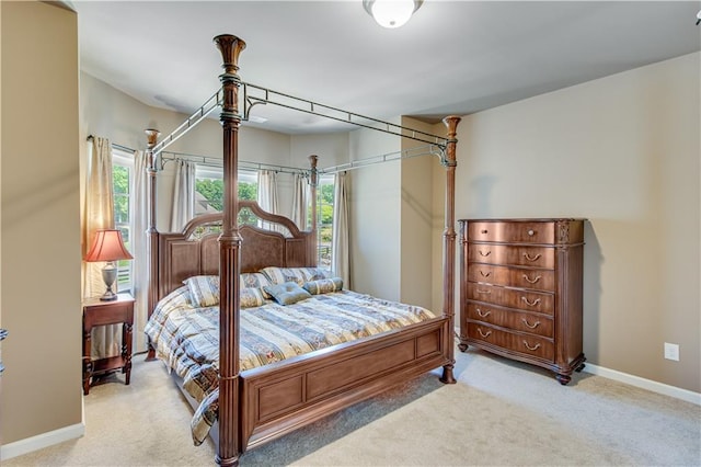8240 Hurakan Creek Xing, Cumming, GA 30028 - carpeted bedroom featuring multiple windows and baseboards
