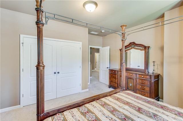8240 Hurakan Creek Xing, Cumming, GA 30028 - bedroom with carpet flooring, a closet, and baseboards