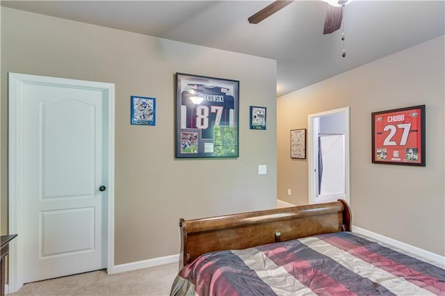 8240 Hurakan Creek Xing, Cumming, GA 30028 - bedroom with baseboards, light carpet, and a ceiling fan