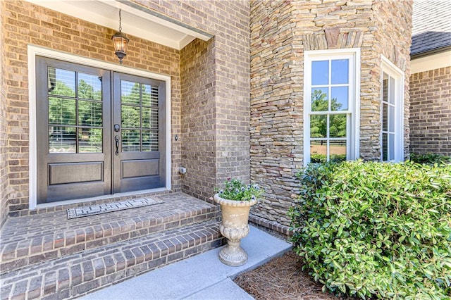 8240 Hurakan Creek Xing, Cumming, GA 30028 - entrance to property featuring french doors and brick siding