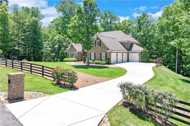 8240 Hurakan Creek Xing, Cumming, GA 30028 - view of front of property with concrete driveway, a garage, and brick siding