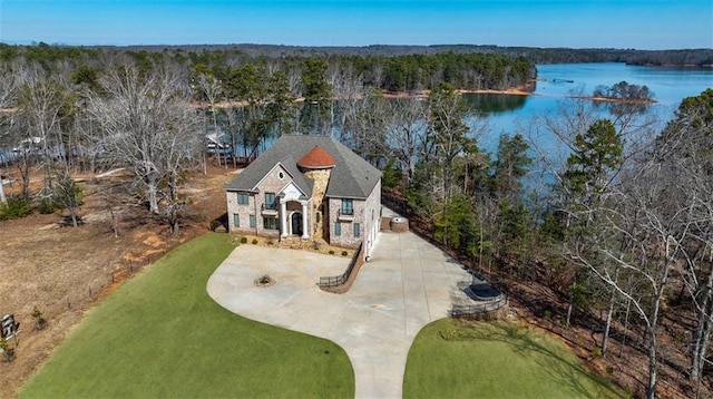 bird's eye view featuring a water view and a view of trees