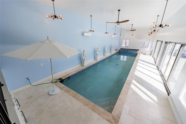 pool with a notable chandelier