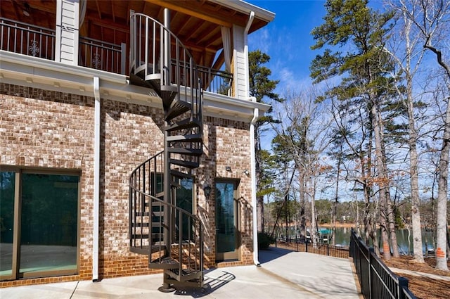 exterior space with brick siding