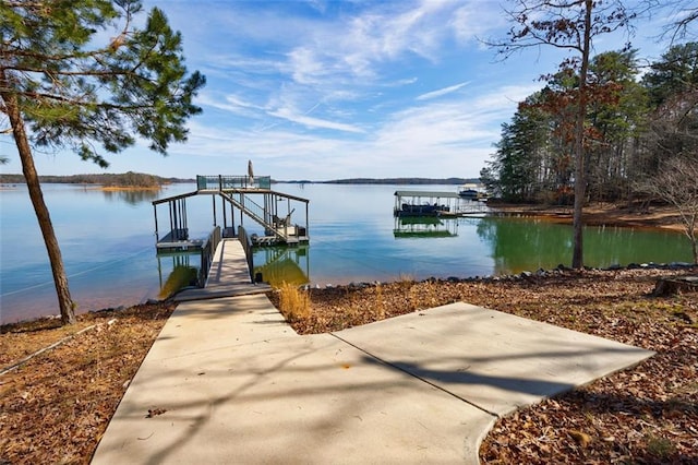 dock area featuring a water view