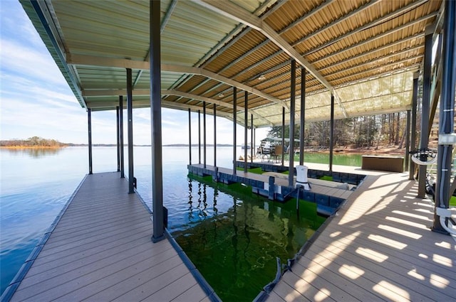 dock area featuring a water view and boat lift