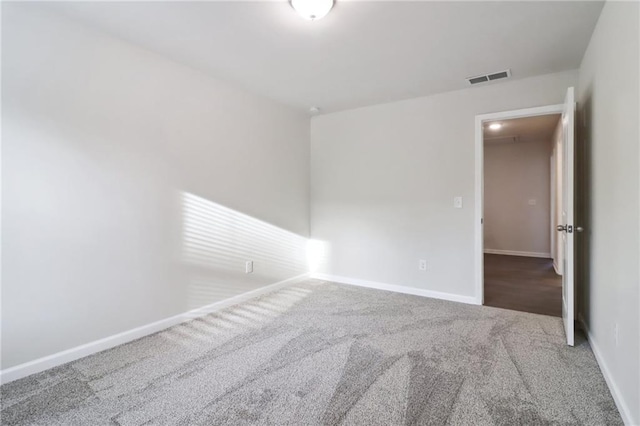 spare room with carpet flooring