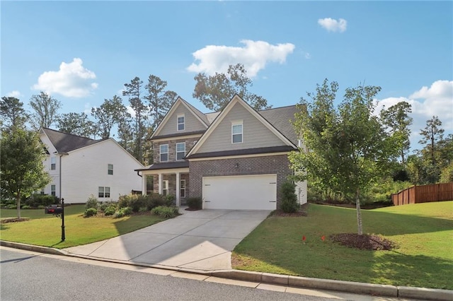 craftsman-style home featuring a front yard and a garage