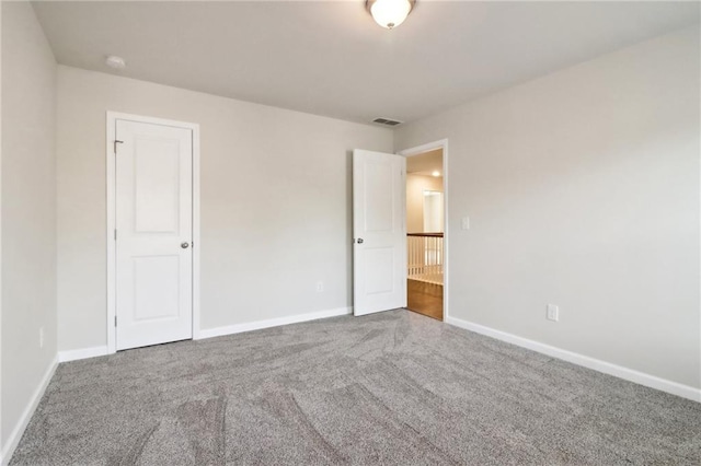 unfurnished bedroom featuring carpet floors