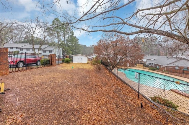 view of swimming pool featuring a storage unit