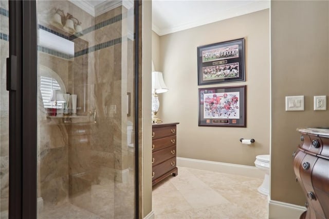 bathroom with ornamental molding, vanity, toilet, and a shower with door