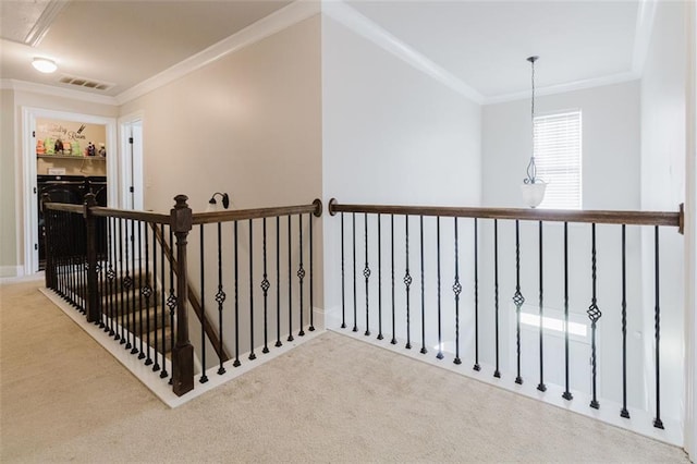 3241 Alhambra Cir, Hampton, GA 30228 - corridor featuring visible vents, ornamental molding, carpet, and an upstairs landing