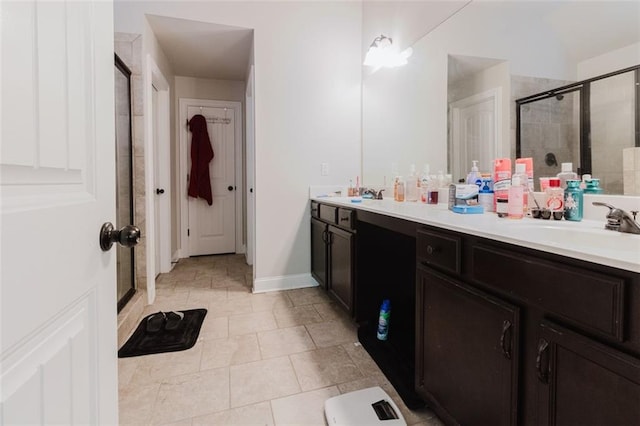 3241 Alhambra Cir, Hampton, GA 30228 - bathroom with double vanity, tile patterned floors, a stall shower, and a sink