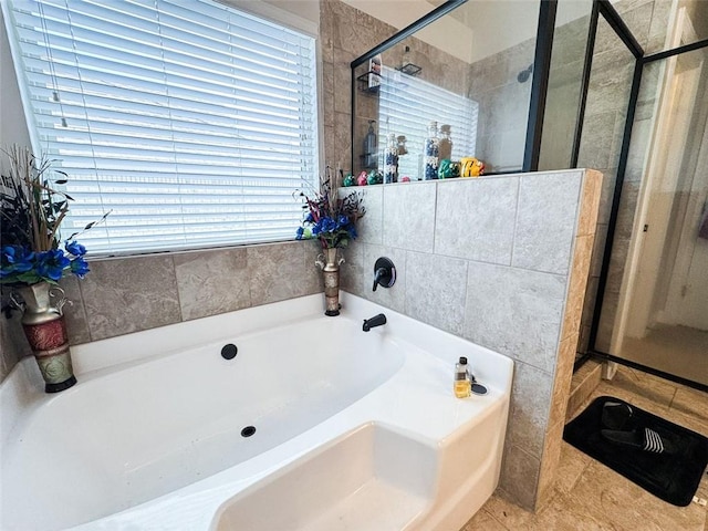 3241 Alhambra Cir, Hampton, GA 30228 - full bathroom with a shower stall and a bath
