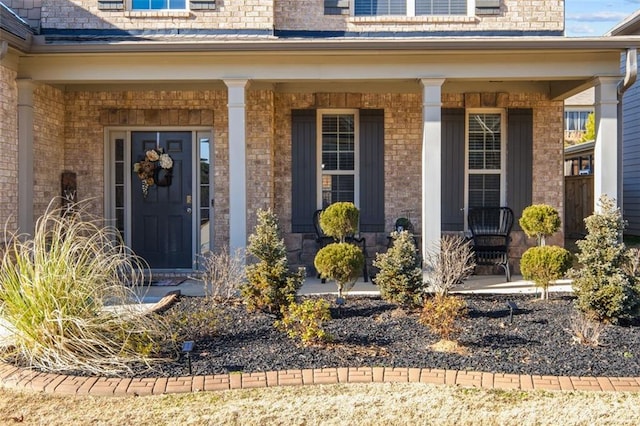 doorway to property with a porch