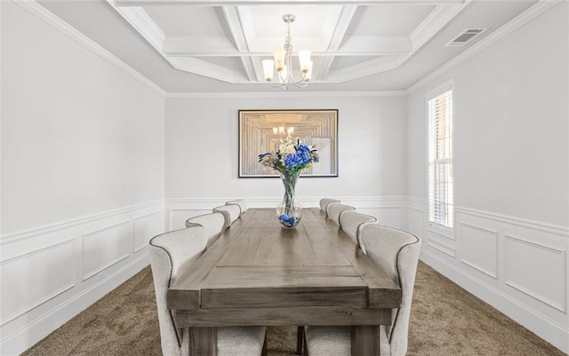 dining room featuring coffered ceiling, a chandelier, beam ceiling, and carpet