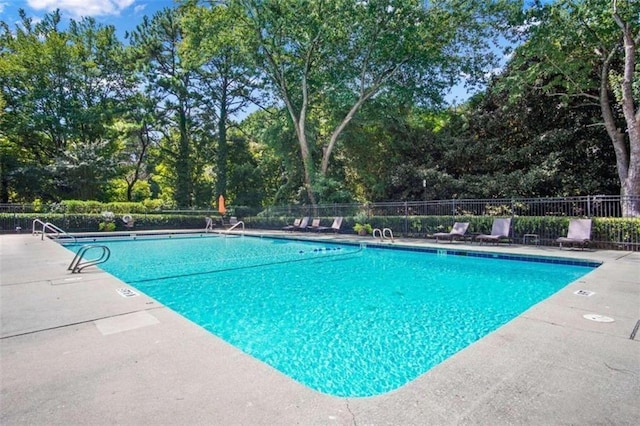 pool featuring fence