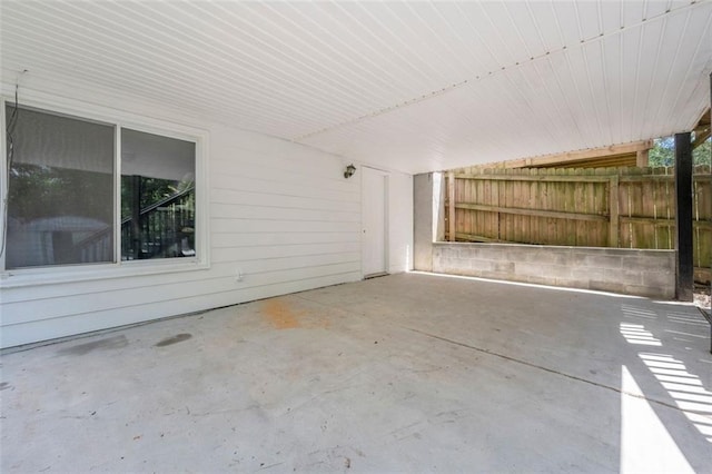 view of patio / terrace featuring fence