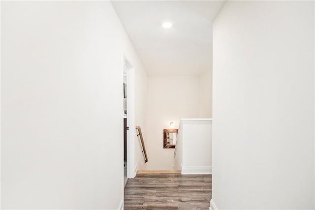 stairway featuring hardwood / wood-style floors