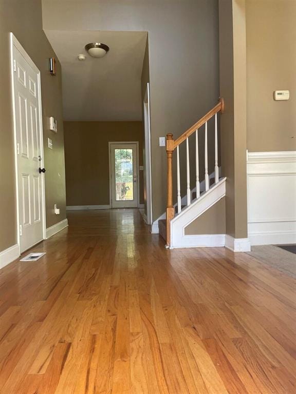 interior space with hardwood / wood-style floors