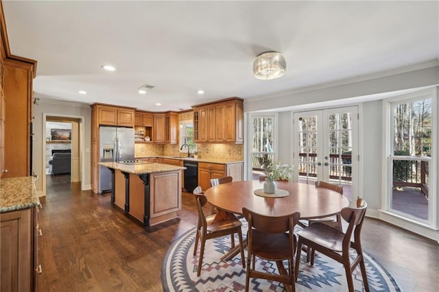 dining area with recessed lighting, baseboards, ornamental molding, french doors, and dark wood finished floors