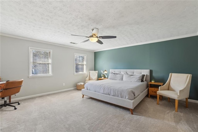 bedroom with a textured ceiling, carpet floors, visible vents, baseboards, and ornamental molding