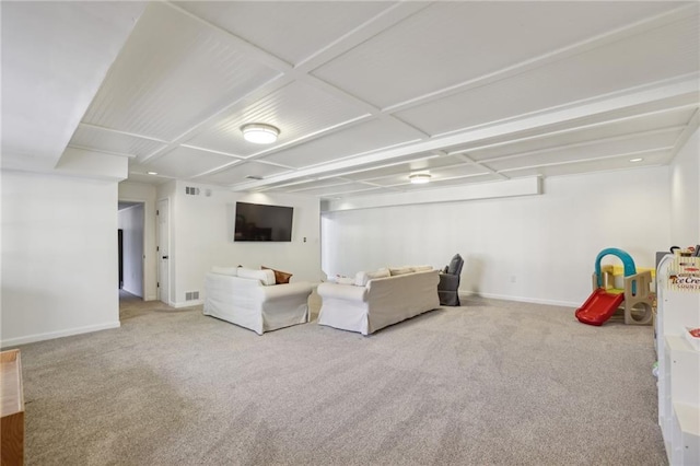 unfurnished living room featuring carpet, visible vents, and baseboards