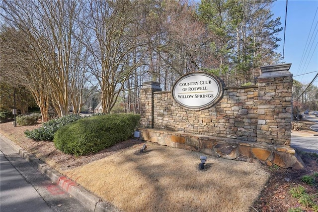 view of community sign