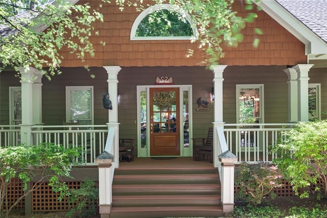 144 Canacaught Pl, Jasper, GA 30143 - property entrance featuring a porch and roof with shingles