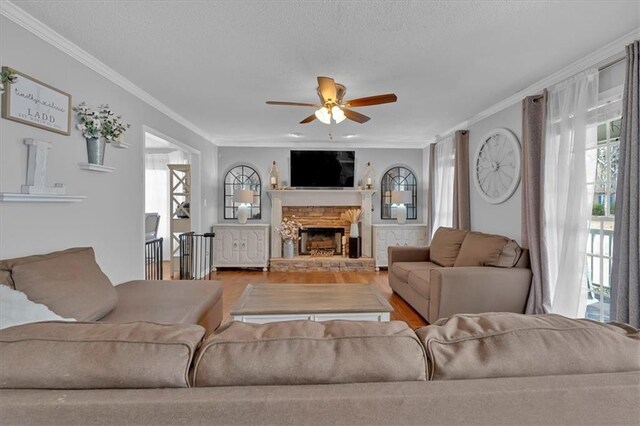 127 Hyde Way, Dallas, GA 30157 - living room with wood finished floors, a healthy amount of sunlight, crown molding, and ceiling fan