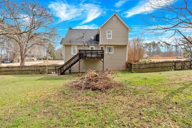 127 Hyde Way, Dallas, GA 30157 - rear view of house with stairway, a wooden deck, a fenced backyard, and a yard