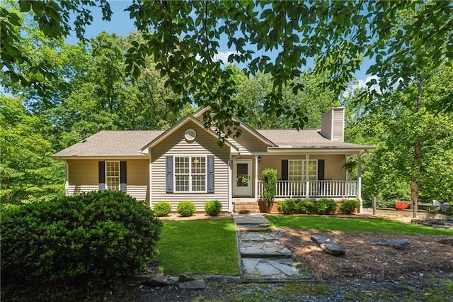 6960 Worley Rd, Cumming, GA 30028 - ranch-style house with a chimney, a porch, a front lawn, and roof with shingles