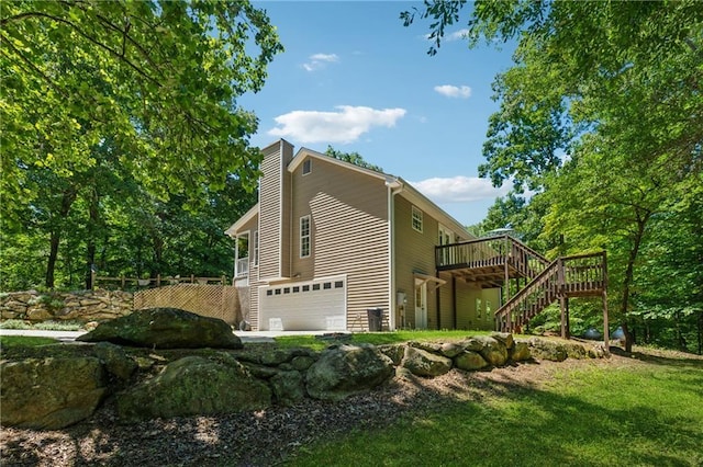 6960 Worley Rd, Cumming, GA 30028 - view of side of property featuring stairs, a wooden deck, a garage, and a chimney