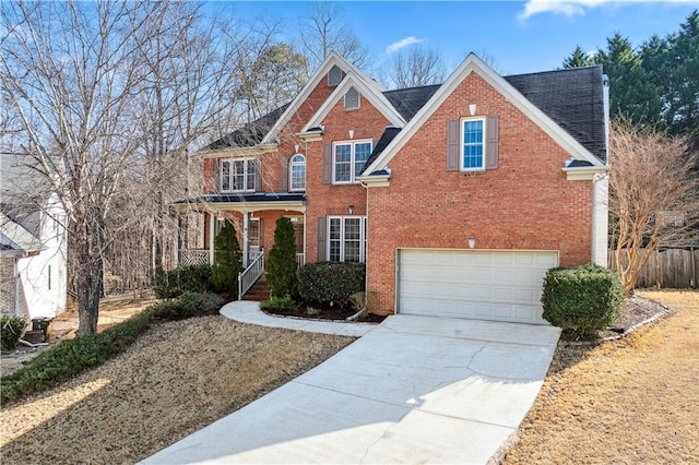 view of front of property featuring a garage