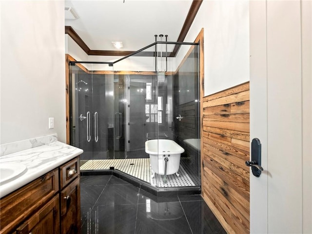 bathroom featuring a shower stall, visible vents, a freestanding bath, and vanity