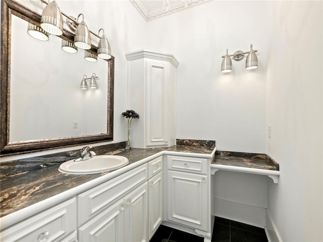 bathroom featuring tile patterned flooring and vanity