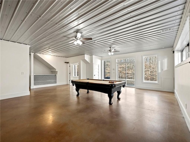 game room featuring finished concrete flooring, pool table, a ceiling fan, and baseboards