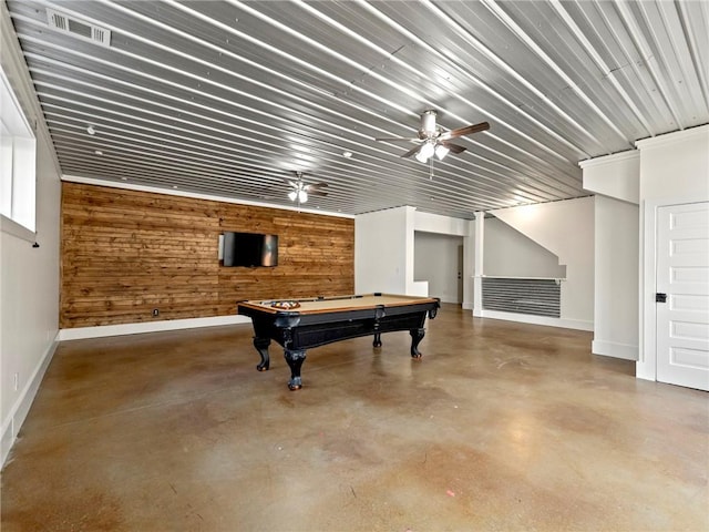 playroom with wooden walls, pool table, visible vents, a ceiling fan, and finished concrete floors