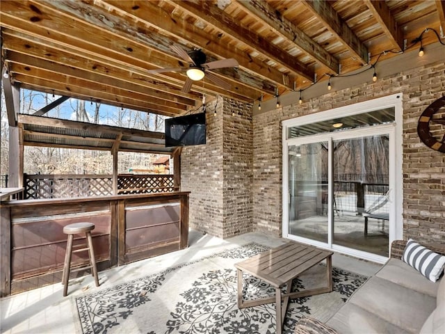 interior space featuring a ceiling fan