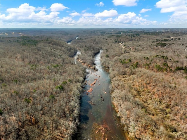 aerial view featuring a view of trees